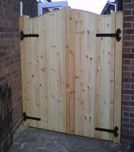 Solid Redwood double gates, black ironmongery